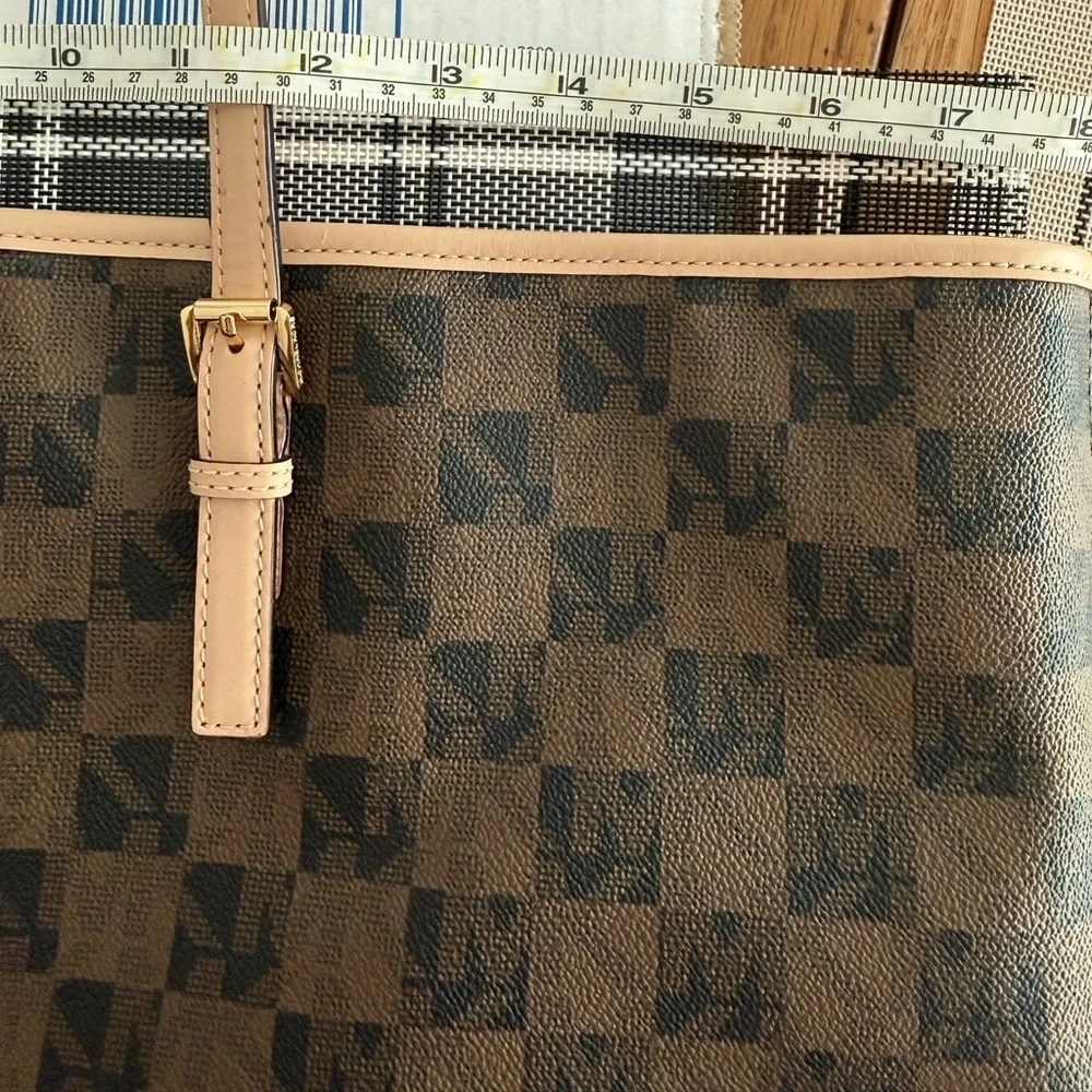 MICHAEL Michael Kors Jet Set travel tote in a brown checkered monogram pattern. - Picture 8 of 10